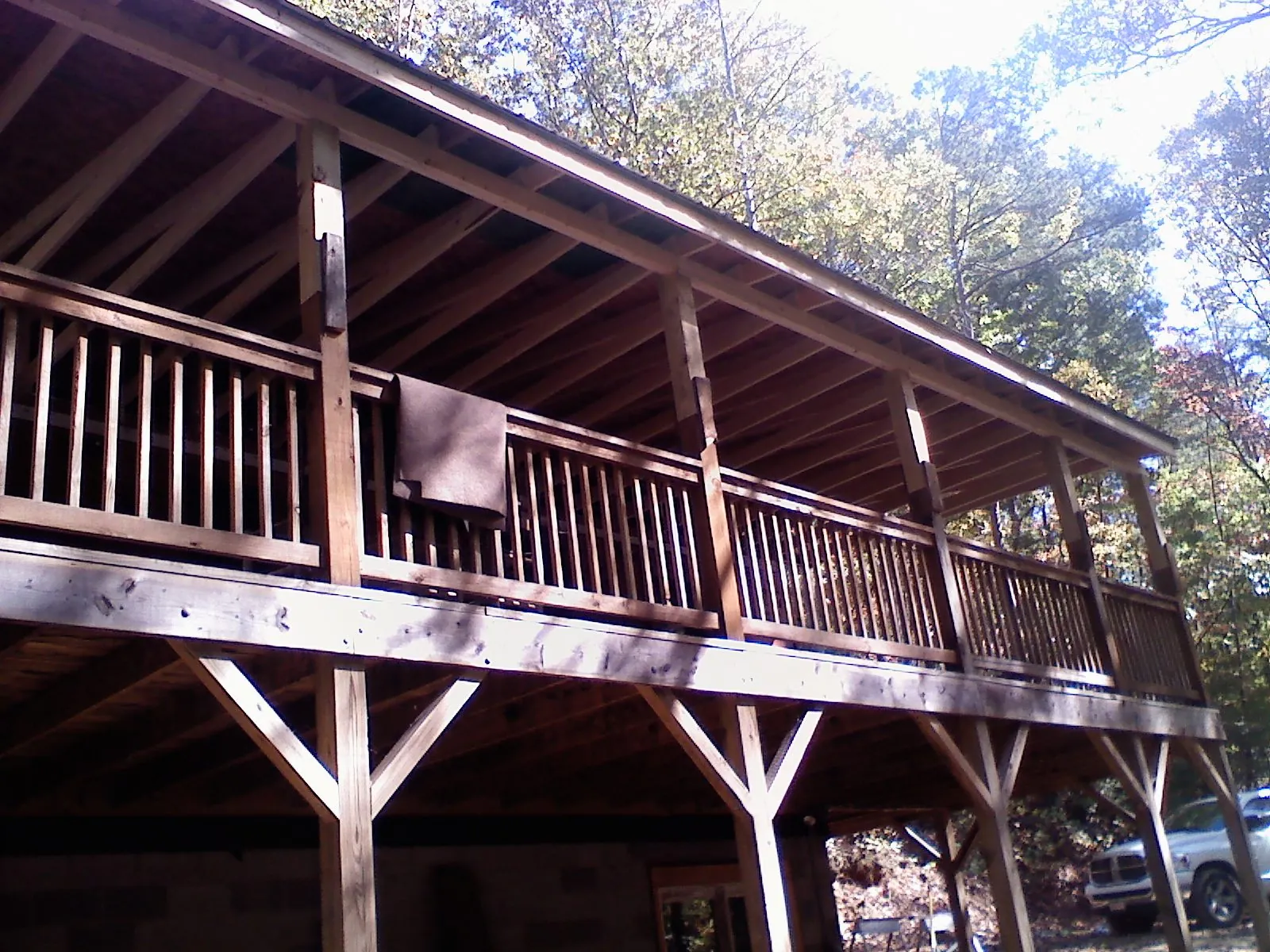 Timber framing under a new elevated porch and deck — Roof Leak Repair in Parish by Roofing Brothers